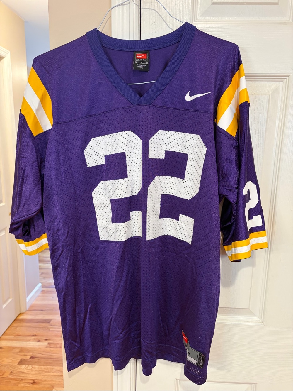 Nike Men’s Purple Football Jersey with White & Gold Accents, #22